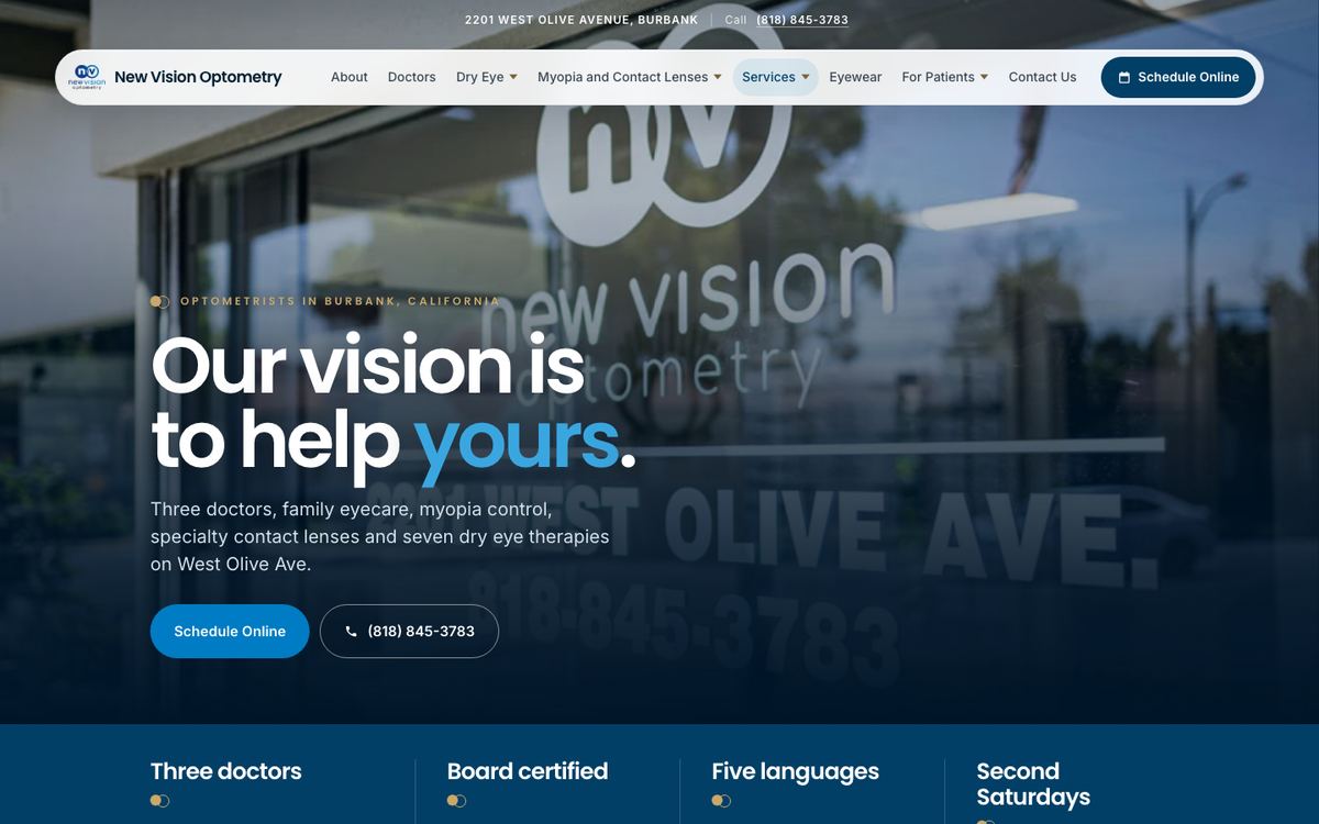 The New Vision Optometry home page: Our vision is to help yours, over the office window